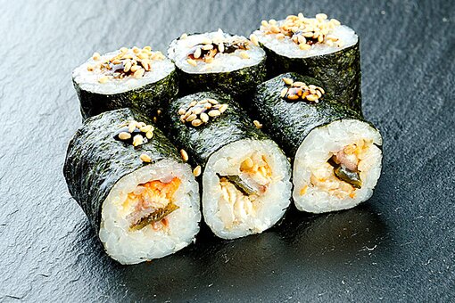 Rolls in the sushi bar &quot;nakama&quot;. order sushi at a discount.